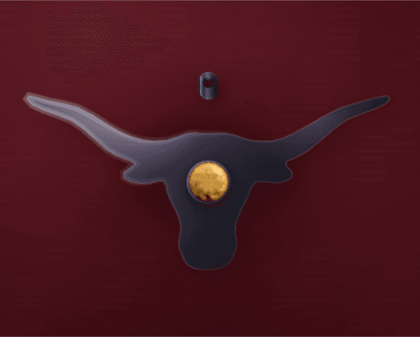 Texas Longhorns pendant — a longhorn silhouette casting with a gold gem